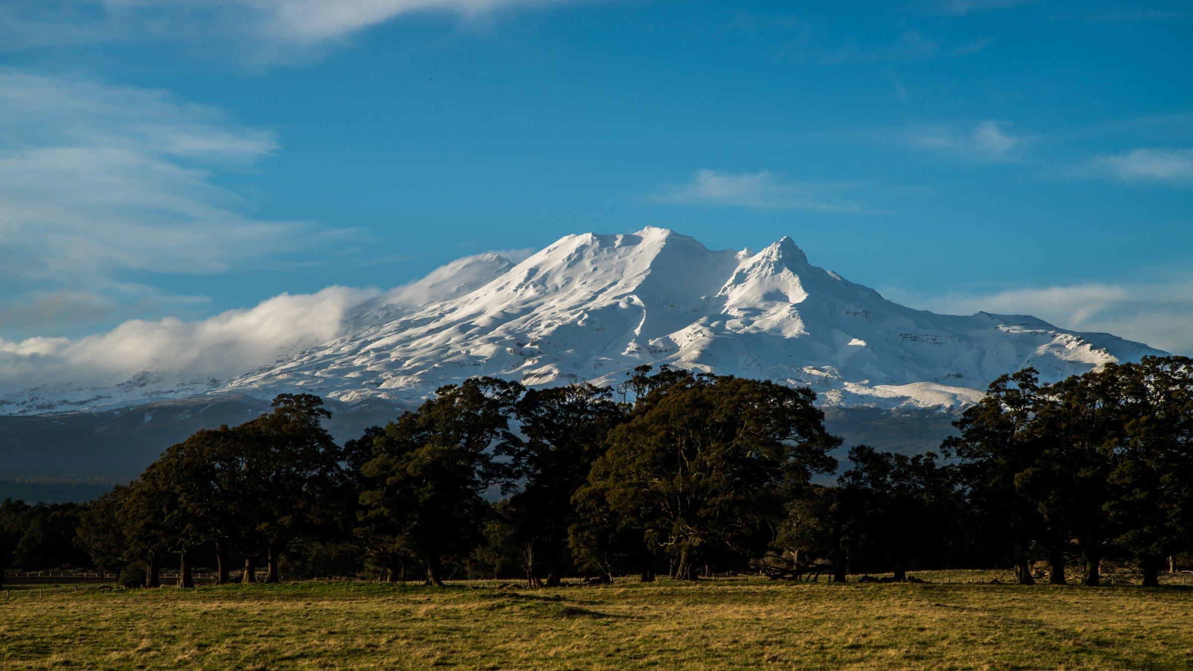 Kune shuttle van below Mt Ruapehu at dusk